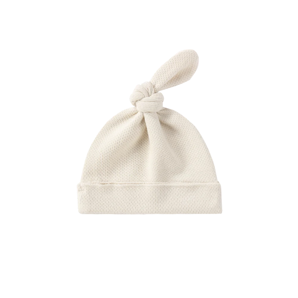 ORGANIC KNOTTED HAT. POWDER (POINTELLE)